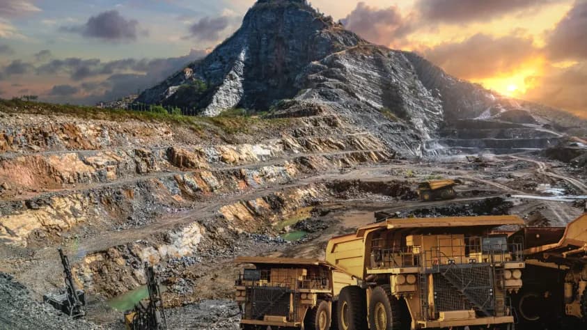 Mining operation with equipment on a mountain site